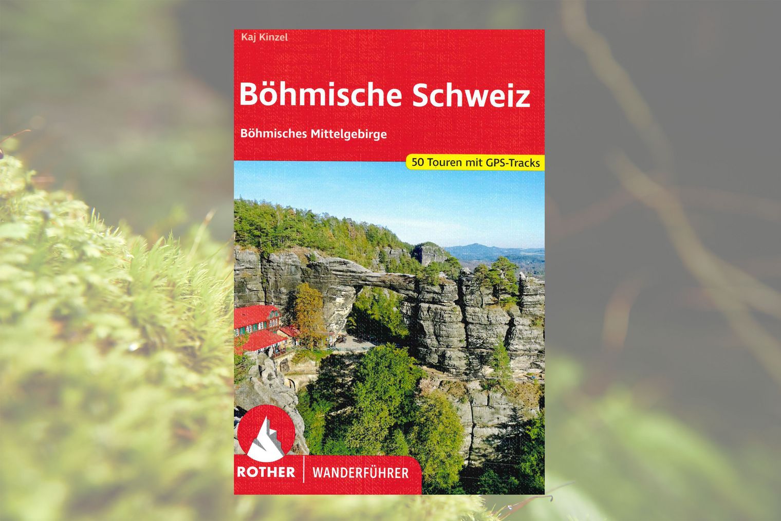 Buchcover mit rotem Hintergrund, Titel "Böhmische Schweiz", Bild von Felstor im Wald.