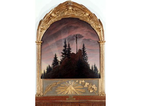 Gemaelde von Caspar David Friedrich, Kreuz einem Gebirge, mit goldenem Rahmen.